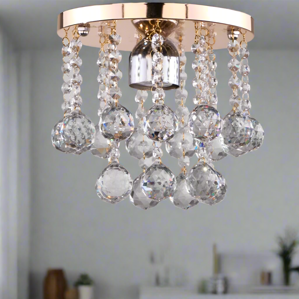 Small crystal and stainless steel chandelier with an elegant touch