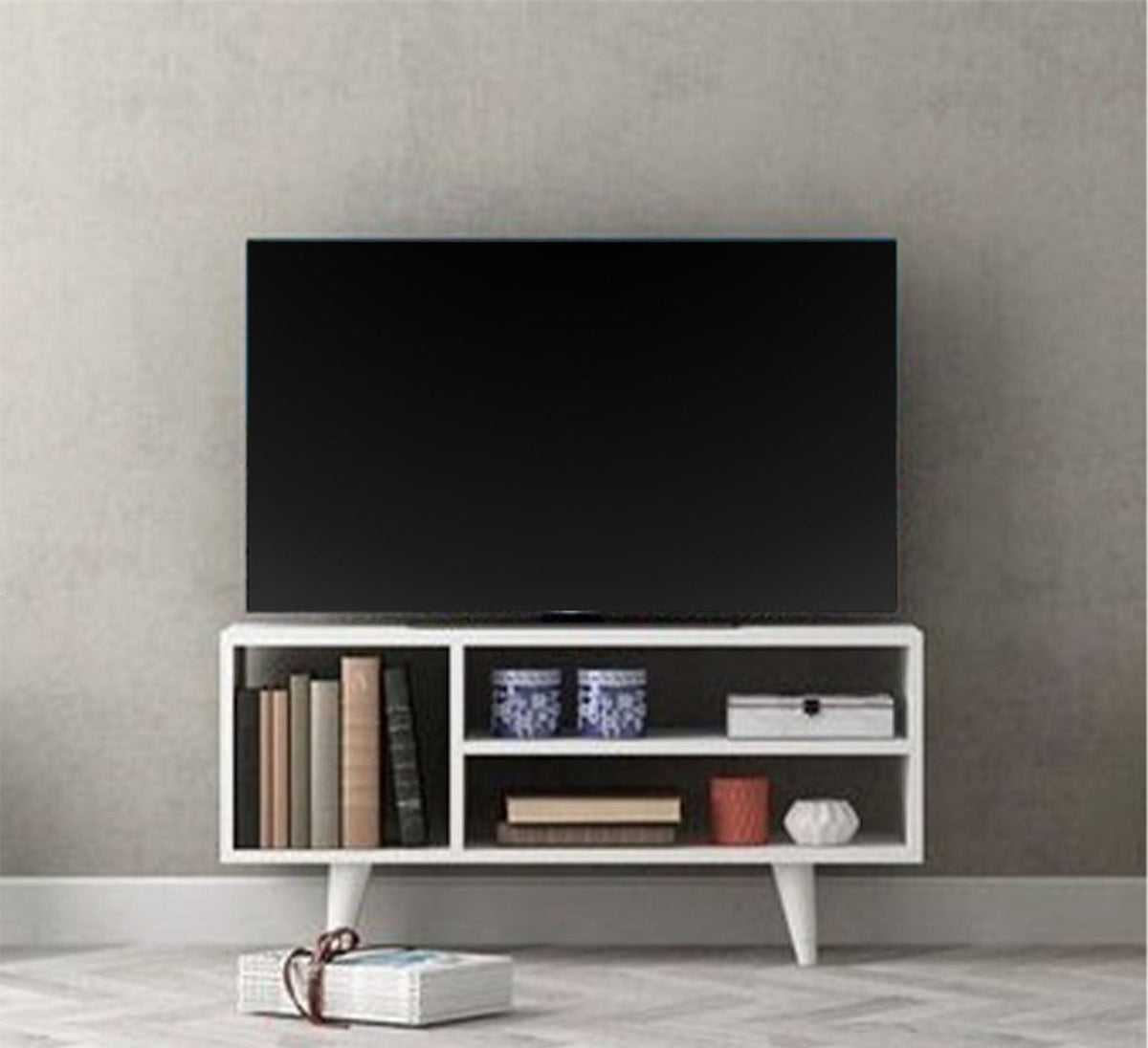 A TV unit with 3 MDF wooden shelves
