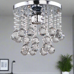 Small crystal and stainless steel chandelier with a luxurious touch