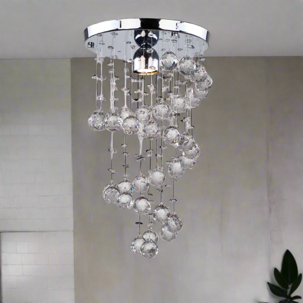 Medium-sized crystal and stainless steel chandelier with a luxurious design