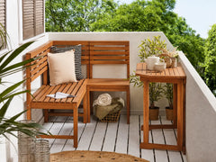 Diana corner made of beech wood, accommodates 4 people.